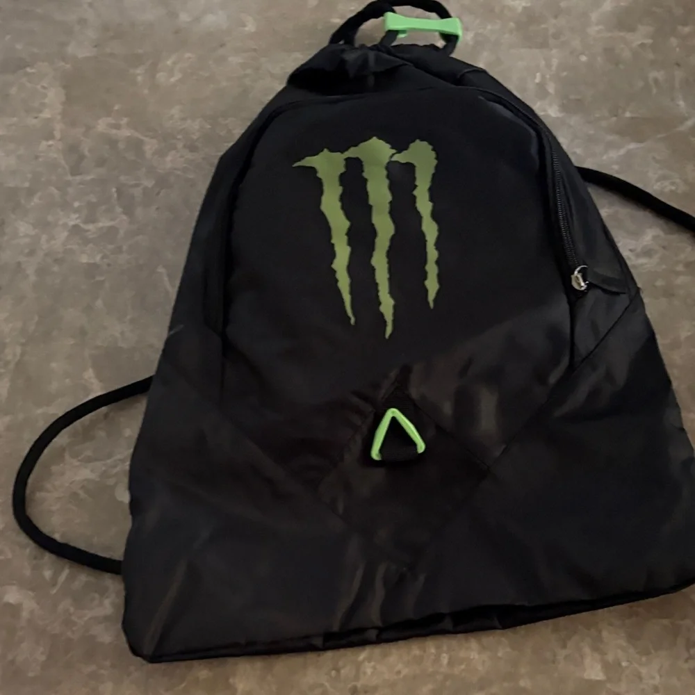 Black Backpack with Green Logo